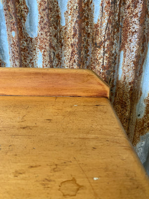 A pine two-drawer desk