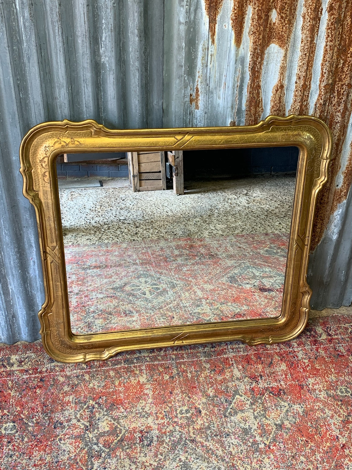A large giltwood wall mirror