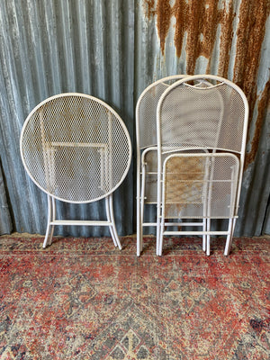 A mid-Century style mesh garden set - table and two chairs