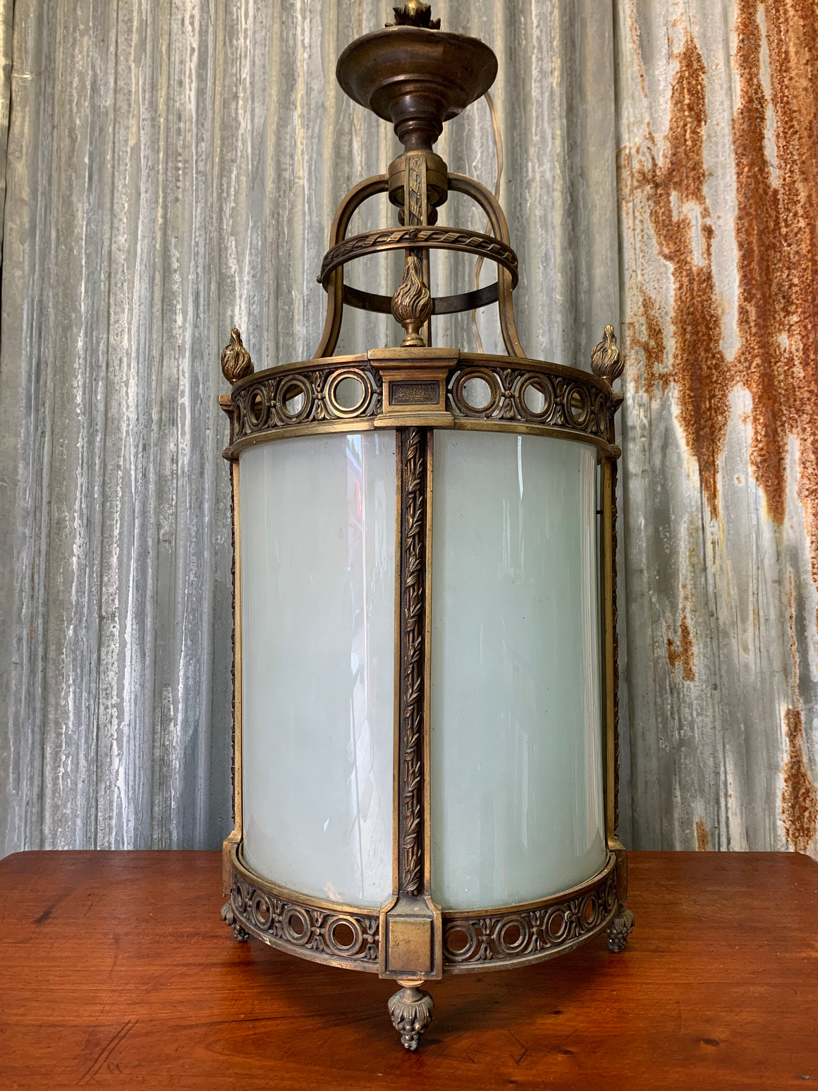 A bronze and glass hall lantern