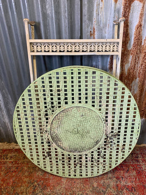A lattice design garden table and chairs set