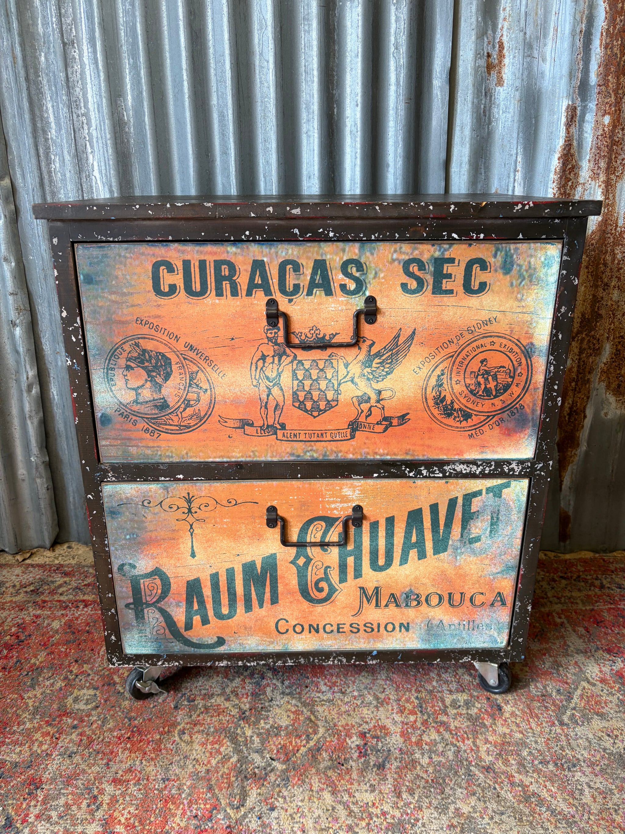 A wine crate chest of drawers on castors