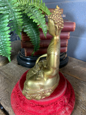 A bronze seated Buddha figure