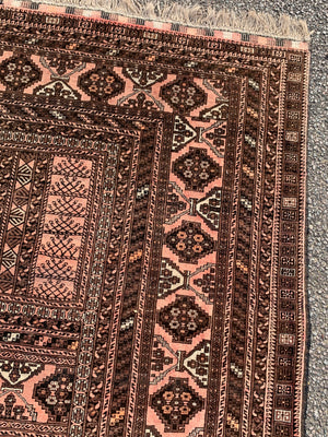 A Persian brown ground rectangular rug- 243cm x 166cm