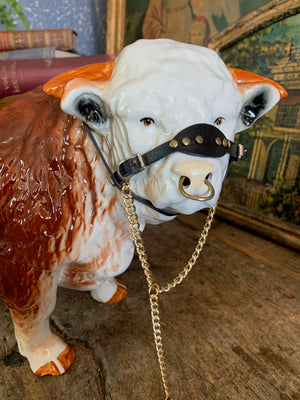 A large ceramic Hereford bull by Nelson Pottery