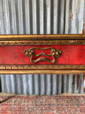 A red lacquer continental table