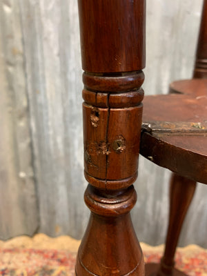 A carved mahogany occasional table with trefoil cloverleaf top