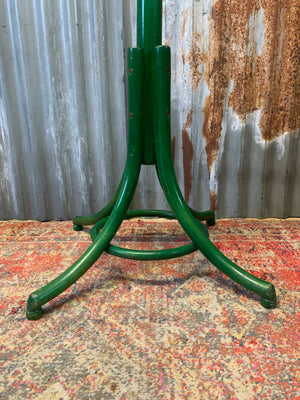 A tall bentwood coat stand with hat rack