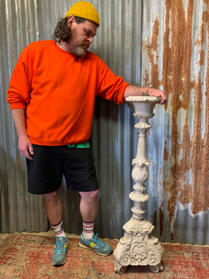 A large stone effect pricket candlestick