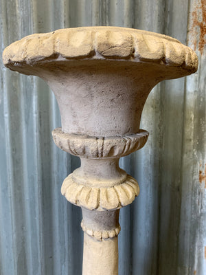A large stone effect pricket candlestick