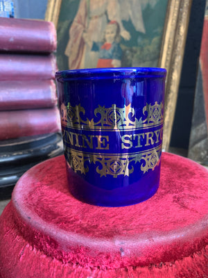 A cobalt blue ‘Strychnine’ apothecary mug