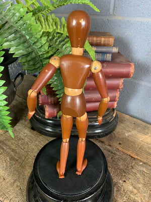 A two tone wooden artist's lay figure