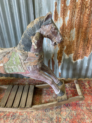 Carved wooden rocking horse