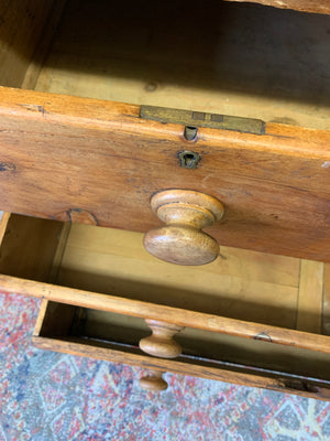 A pine chest of two over two drawers