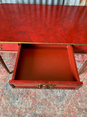 A red lacquer continental table