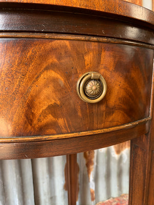 A serpentine desk and leather chair by Bevan Funnell