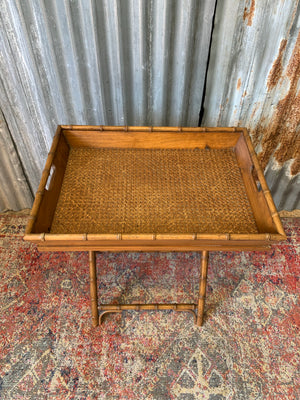 A faux bamboo butler's tray table