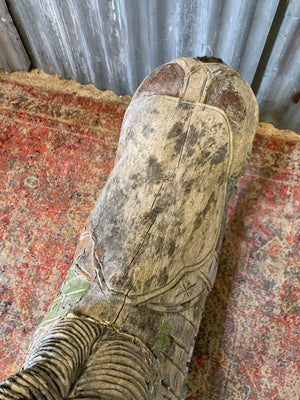 Carved wooden rocking horse