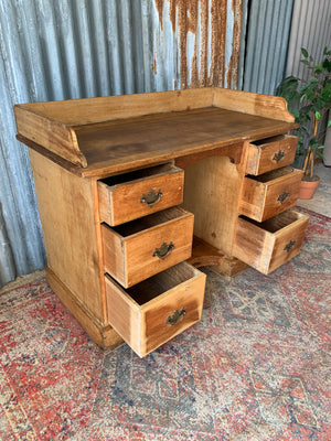 A pine clerk's desk with galleried top
