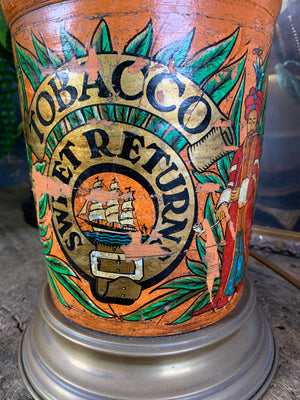 A converted tobacco jar lamp