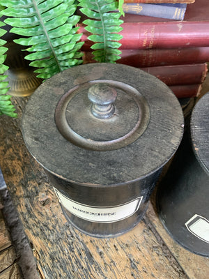 A set of three lidded wooden apothecary jars