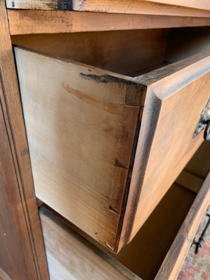 An Art Nouveau chest of drawers