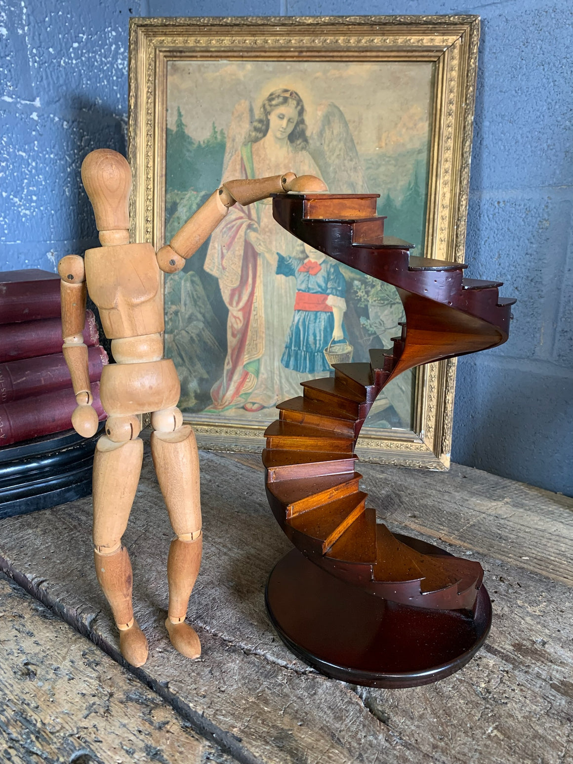 A wooden spiral staircase model