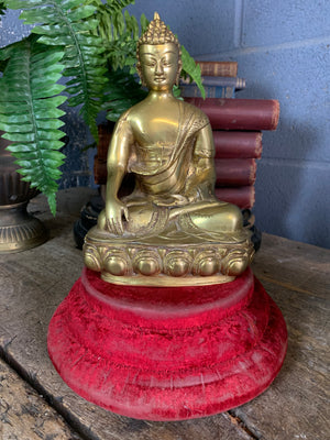 A bronze seated Buddha figure