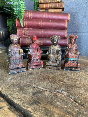 A group of four Chinese carved wood and gesso figures