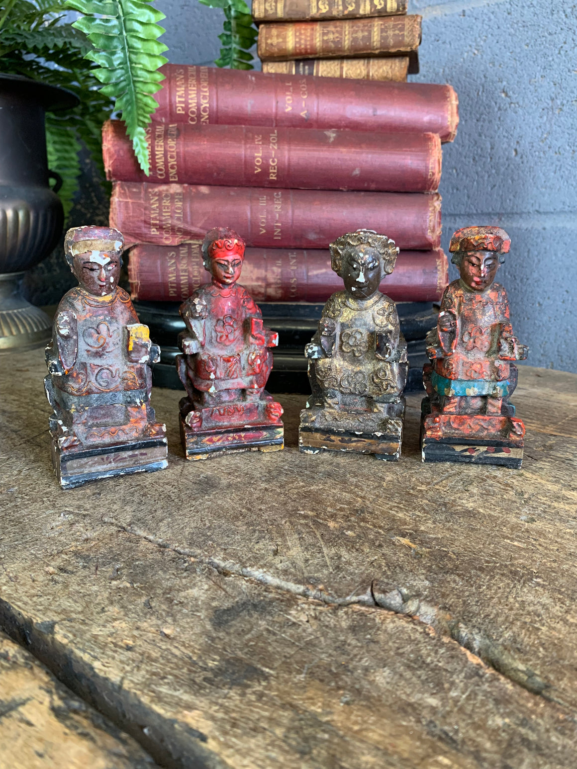 A group of four Chinese carved wood and gesso figures