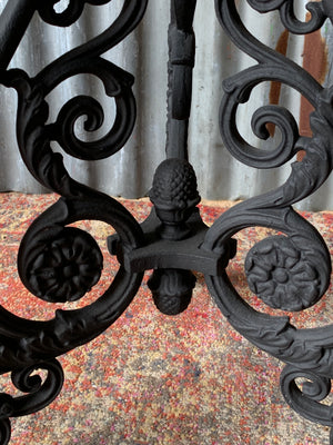 A black cast iron pub table