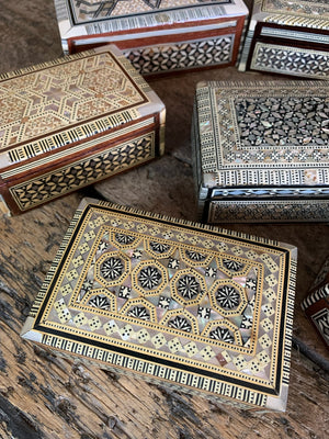 A collection of 12 mother of pearl inlaid Syrian boxes