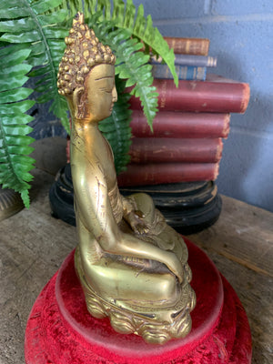 A bronze seated Buddha figure