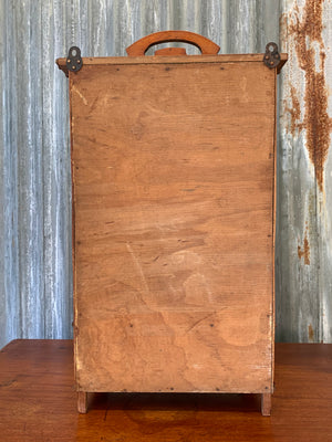 A small French faux bamboo mirrored cabinet