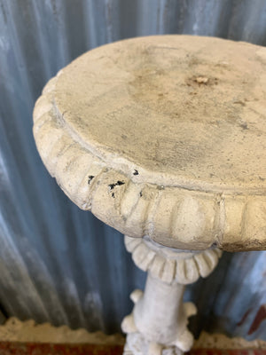 A large stone effect pricket candlestick