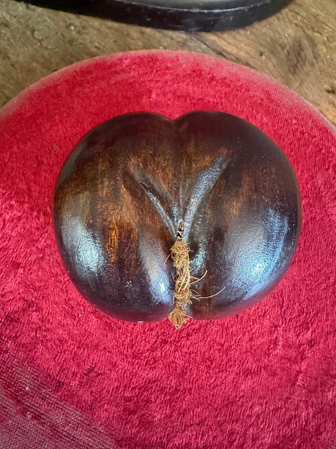 A carved wooden coco de mer specimen (small)