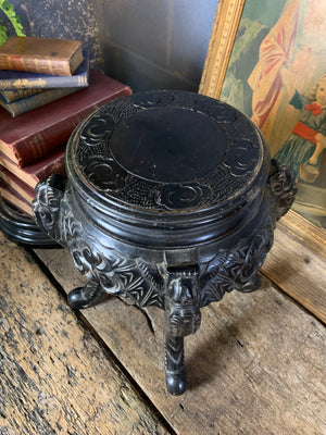 A small Chinese ebonised pedestal stand