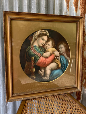 A framed 19th Century print of Raphael's "La Madonna Della Sedia Seggiola"