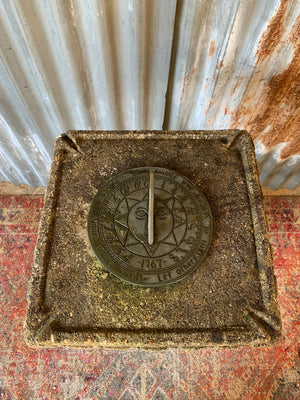 A large cast stone sundial