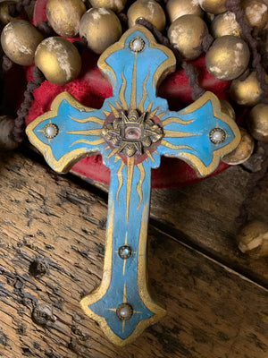 A set of oversized wooden rosary beads with eye motif