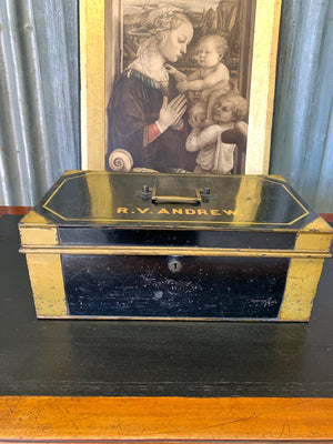 A Victorian black metal strong box with lock and key