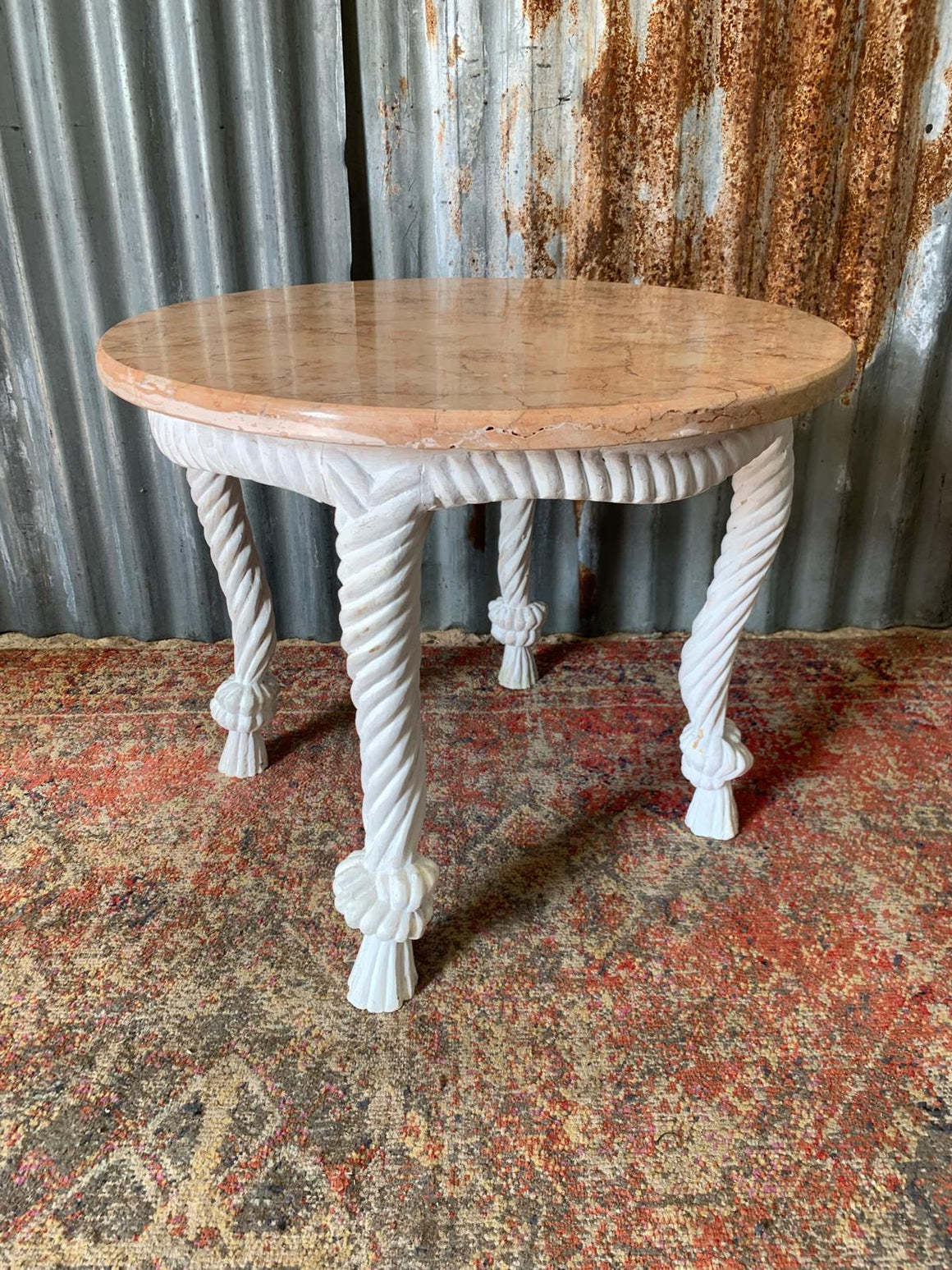 An Italian giltwood and marble rope tassel table