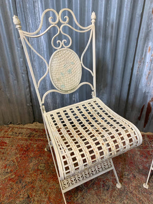A lattice design garden table and chairs set