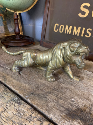An extra large brass Mid-Century Hollywood Regency tiger statue