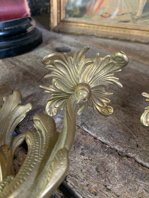 A pair of heavy brass Rococo style candle scones