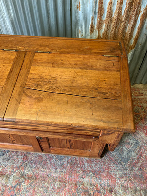 A pine double lectern standing desk