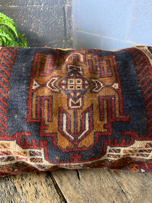 A Persian gold ground rectangular carpet cushion - 104cm x 62cm