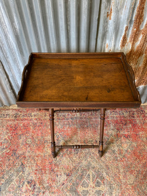 An oak butler's tray table