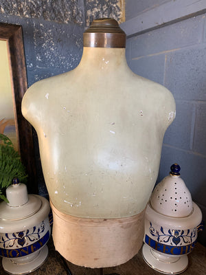 An adult male mannequin shop display model on cast iron base