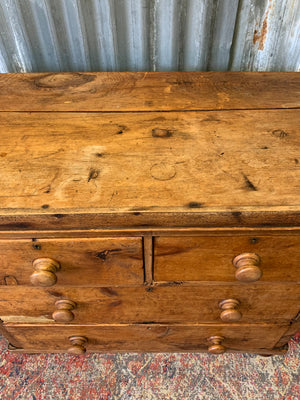 A pine chest of two over two drawers